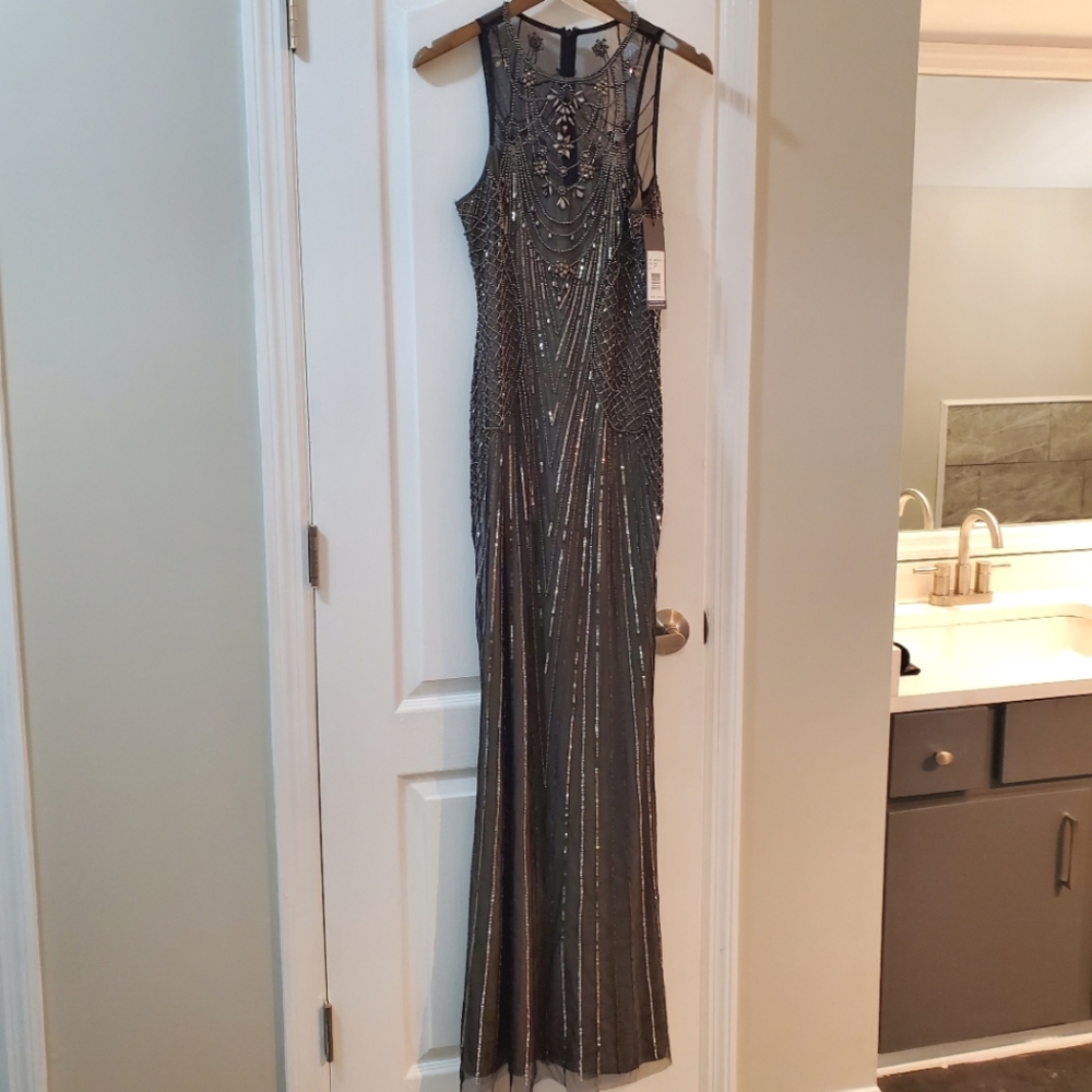 Formal dress Parker size 4. Grey, sequined and beaded. New with tags.